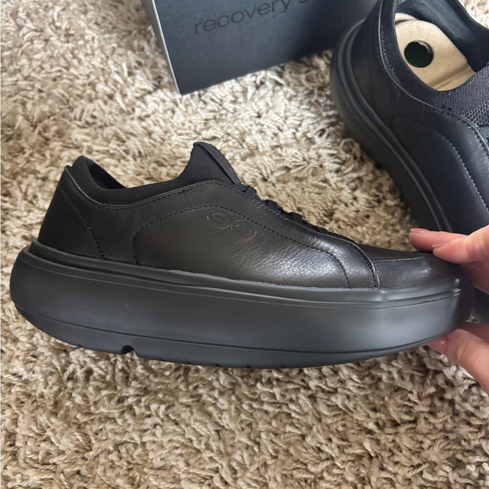 OOFOS Women's Slip-On Black Leather Casual Sneakers - Picture 5 of 7